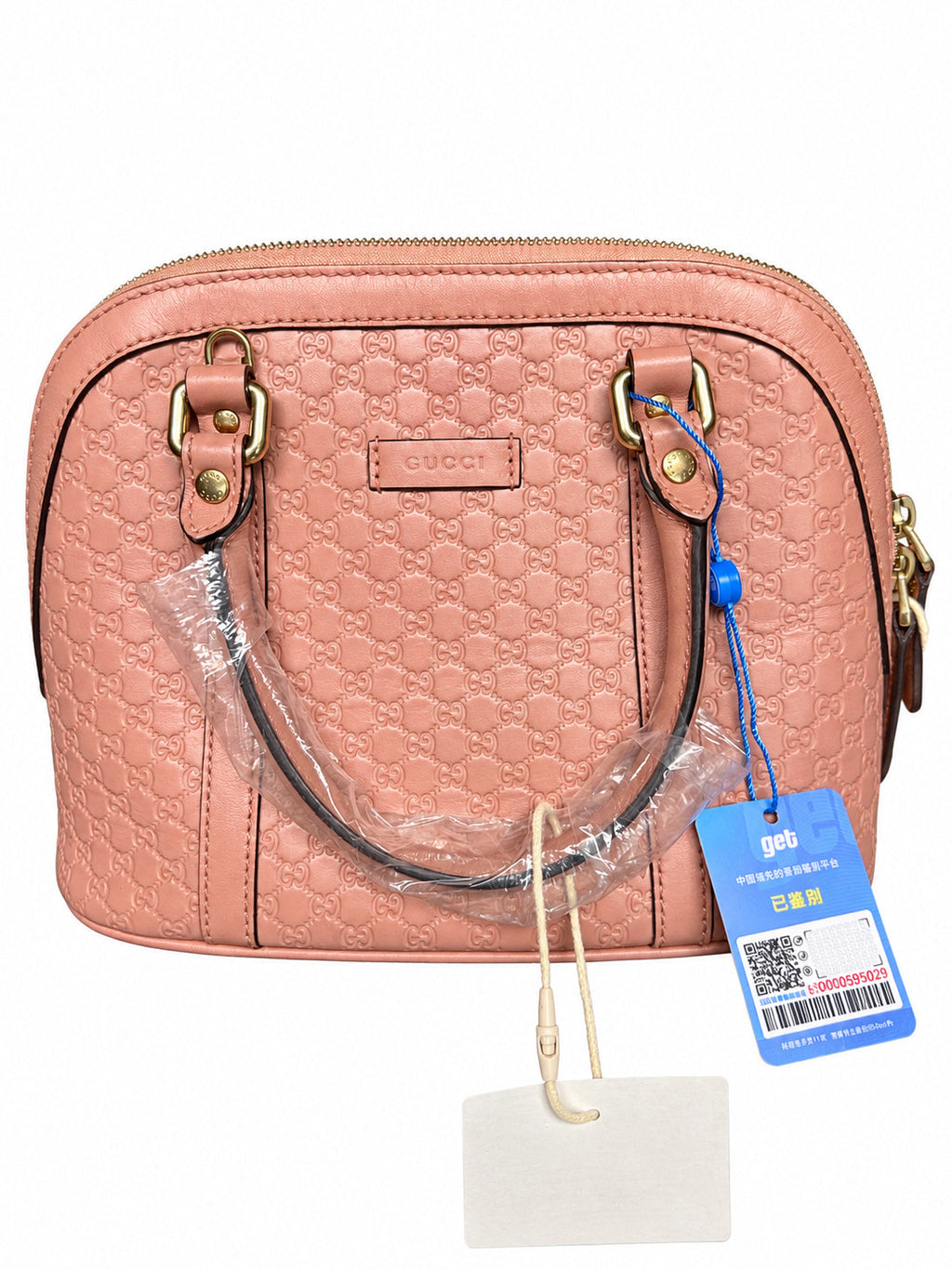 02 Pre-owned GUCCI Pink Microguccissima Dome Bag actual item white background