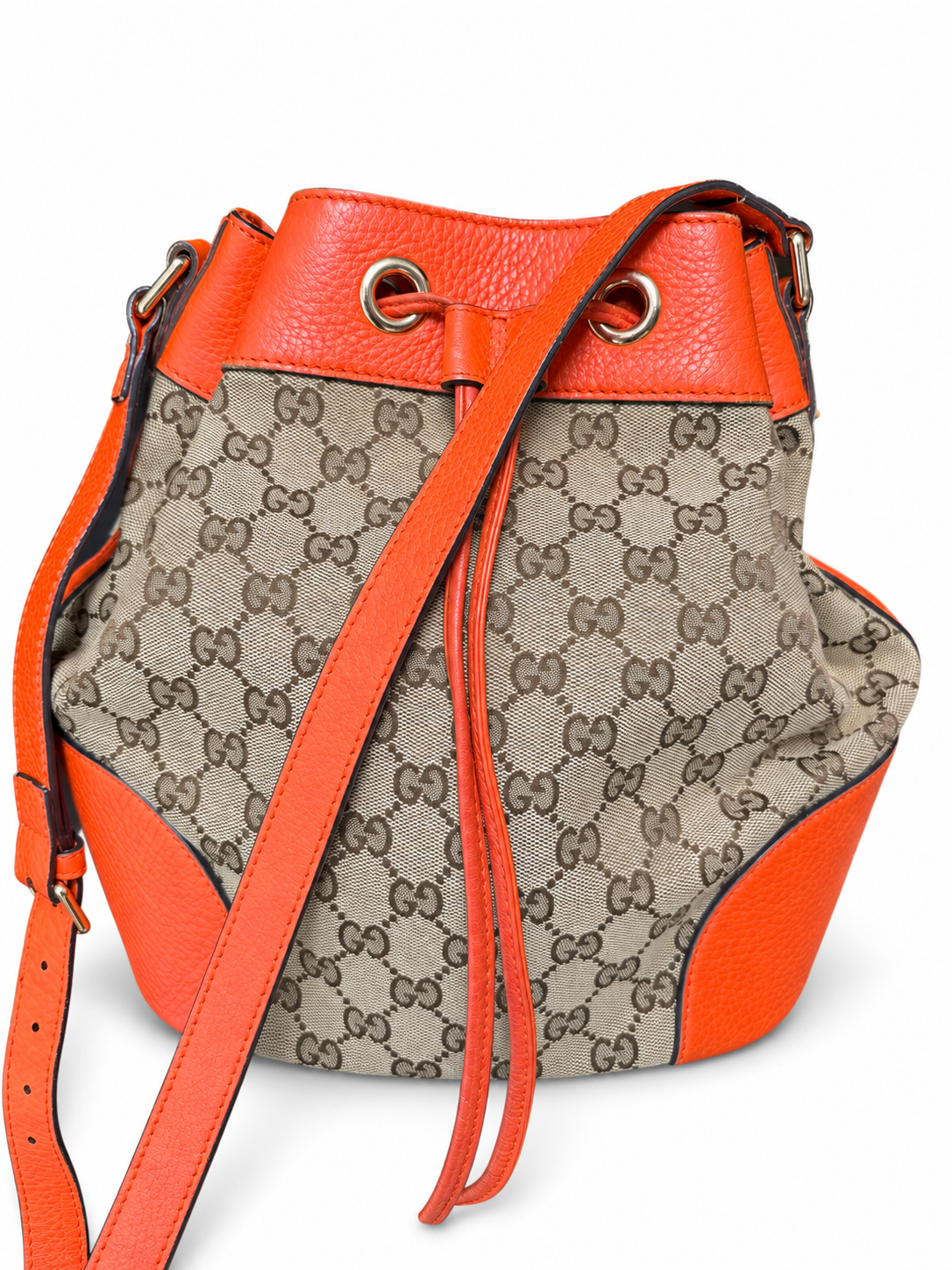 34 Pre-owned GUCCI GG Canvas Orange Trim Drawstring Bucket Bag actual item white background